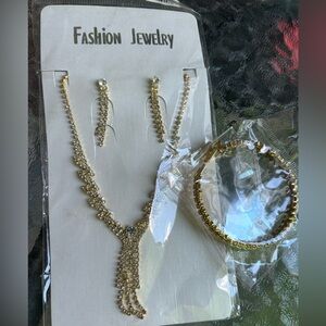 NWOT Costume set necklace + bracelet + pair of earrings with rhinestones